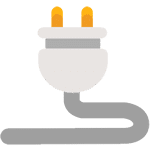 UK plug and cable on green background.