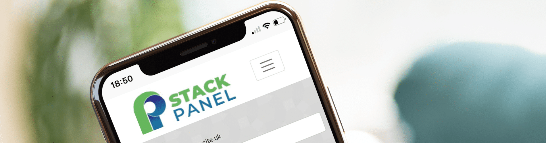 Smartphone displaying Stack Panel website homepage.