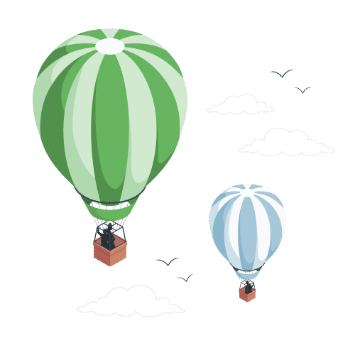 Two hot air balloons floating among clouds.
